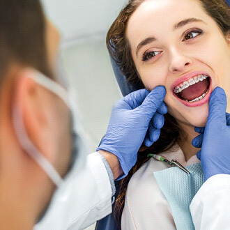 a patient visiting their orthodontist